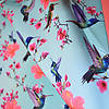 Pieni lisäkuva, jossa Softshell digiprint kolibrit ja kukkaoksat